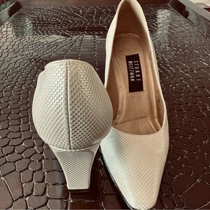 Stuart Weitzman light gold, textured pumps.